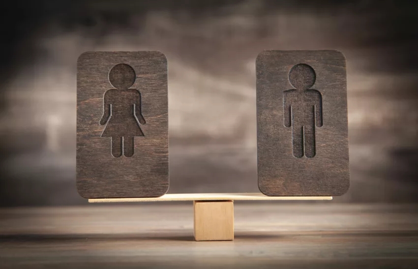 Balance Scale With A Male And Female Symbols.